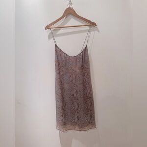 Tahari slip spaghetti strap 100% silk dress. Size 12.
NEWLY dry cleaned.